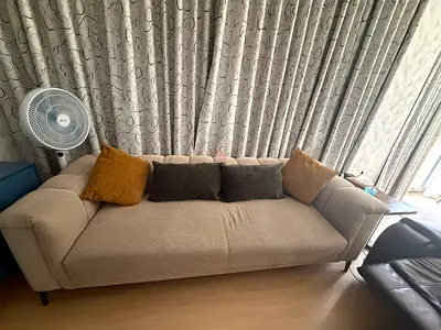 3-seater beige fabric sofa in good condition