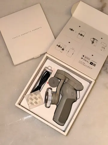 DJI Osmo Mobile Handheld Smartphone Gimbal with accessories - Like new