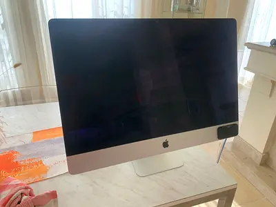 Apple iMac 27-inch all-in-one computer with large display.