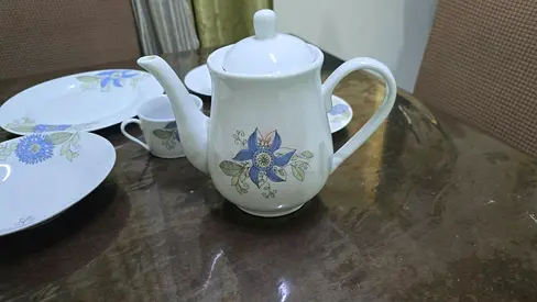 White Ceramic Tea Set with Blue Floral Pattern