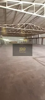 Warehouse with mezzanine, 10,000 sq. ft. area, 15 kW electricity supply; suitable for storage.