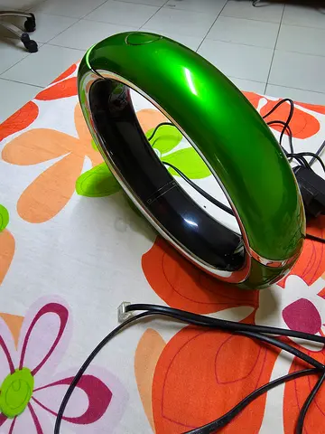 Compact bladeless desk fan — green, works fine