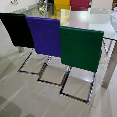 Modern Glass Dining Table with 6 Colorful Chairs - Good Condition