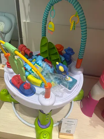 Baby activity jumper with toys - gently used