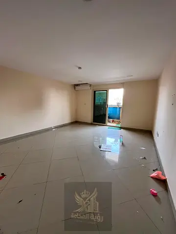 For annual rent in Al Majaz 2, opposite City Centre Sharjah. Two bedrooms and living room, 2 bathrooms, balcony, split AC, payment in 12 installments.