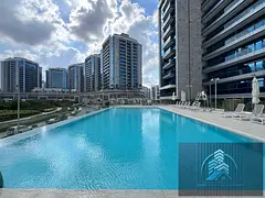 POOL VIEW CHILLER FREE FANTASTIC 1BHK WITH KITCHEN APPLIANCES AND AMAZING VIEW READY TO MOVE