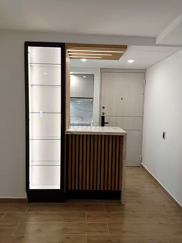Compact modern wooden  bar with glass display unit