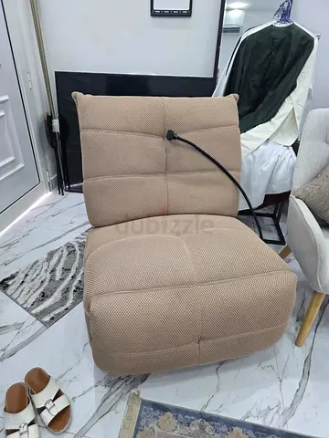 Beige Upholstered Fabric rocking lounge chair