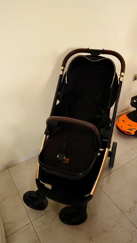 Used black 4wheel stroller in good condition