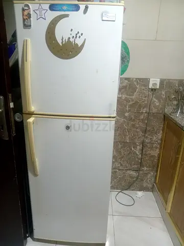 Used two-door refrigerator - good working condition