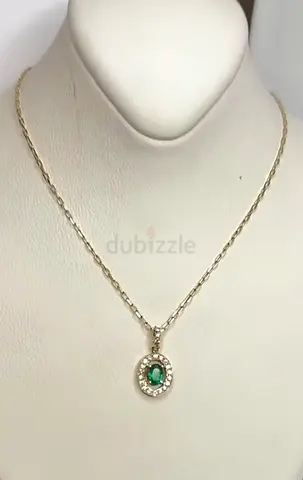 18 k  necklace with emerald and diamond pendant with 18 inch chain