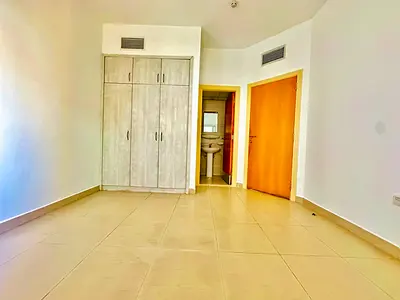 On Sharjah Dubai border Front of Bus station 2Bhk with wardrobe balcony master bedroom two full washroom — Maintenance free