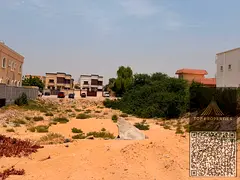 Two plots of land for sale, each measuring 5000 sq ft. Excellent location near the main road, with f