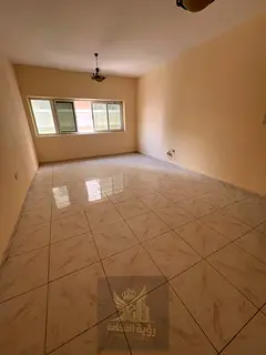 For Annual Rent: One-bedroom apartment with a living room in Al Khan, Sharjah, located behind Afamia