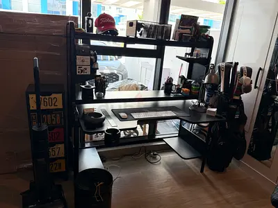 IKEA Fredde Black computer desk with overhead shelves and side storage