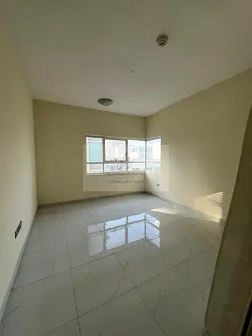 Two-bedroom apartment with a living room, balcony, open view, spacious rooms, and free maintenance.