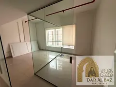 Commercial office for annual rent in Al Qasba, suitable for all commercial activities. Free air cond