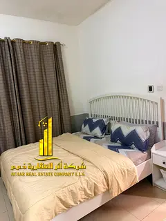 Luxury apartment, second occupancy, one bedroom and living room with an open view. Ajman City Tower.