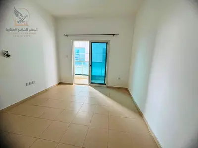 Beautiful 1-bedroom apartment with a living room in City Tower, Sheikh Khalifa Street, featuring a balcony and private parking. Next to Safir Mall and