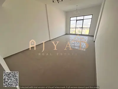 For annual rent in Ajman, Al Liwara – Brand-new 1BR apartment with balcony, free parking, central AC, built-in wardrobes, near all services.