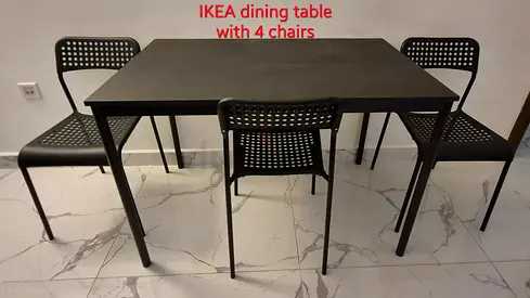 IKEA black dining table with 4 chairs - very good condition