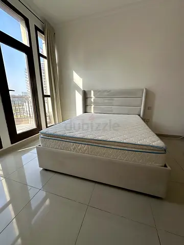 Upholstered Queen Bed with Mattress ( Perfect condition)