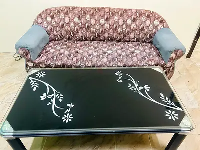 5-seater fabric sofa with glass-top coffee table - used, good condition