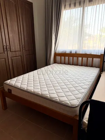 Bed with mattress