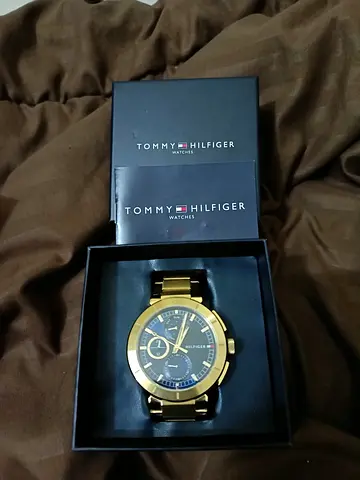 Gold-tone Tommy Hilfiger men's watch with blue dial