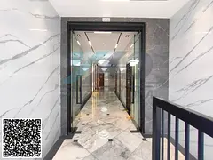For rent in Ajman, Al Jurf 2: a 2-bedroom apartment with a living room, near the school complex.