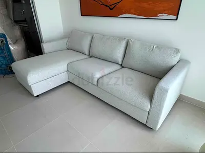 Light grey L-shaped 3-seater sofa with chaise — good condition