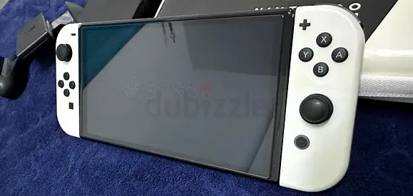 White Nintendo Switch OLED - Good Condition, Comes with Joy-Con