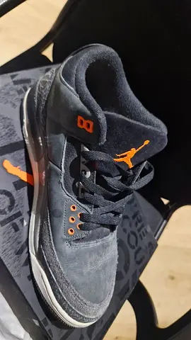 Used Air Jordan 3-style grey suede sneakers,