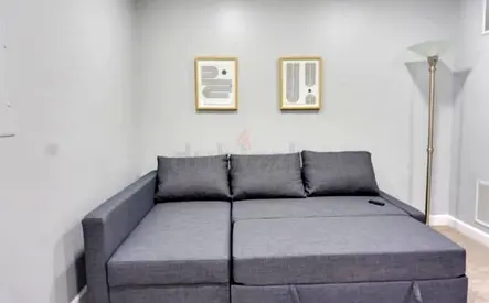 Grey L-shaped Sofa Bed with Storage — Good Condition