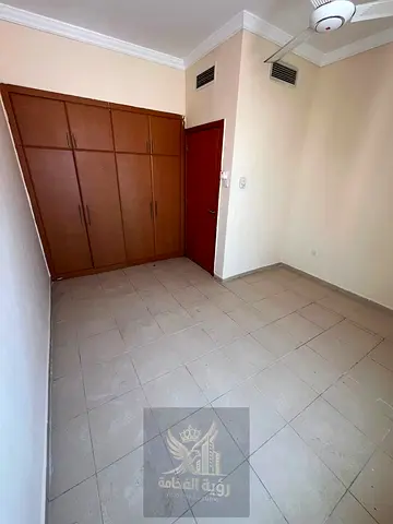 2BR Apartment with Sea View, Balcony & Central AC for Annual Rent in Al Qulaya