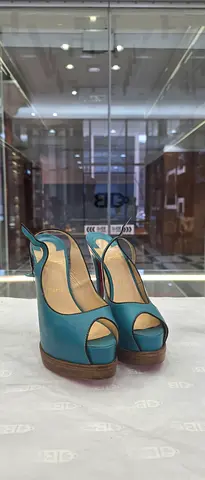 Blue leather peep-toe slingback heels, size available
