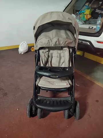 Graco beige baby stroller - well used, folds, with tray