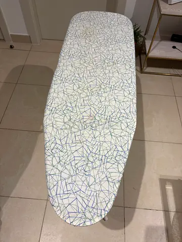 Used ironing board with cover