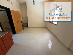 Spacious ground-floor studio on Ajman Corniche, bright, central AC, prime location with easy access