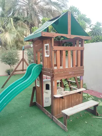 Wooden Outdoor Playhouse with Slide and Swing - Good Condition