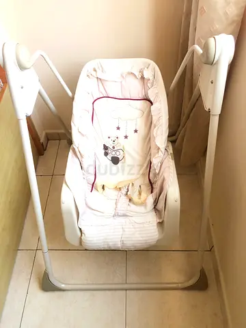 Used Junior Brand baby swing/rocker in good condition