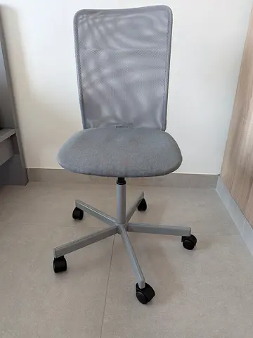 Swivel grey office chair on wheels - good condition