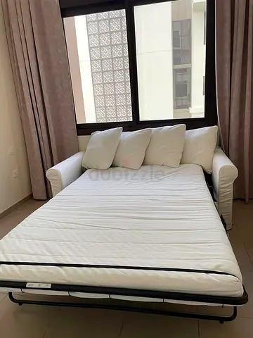White Pull-Out Sofa Bed with Cushions