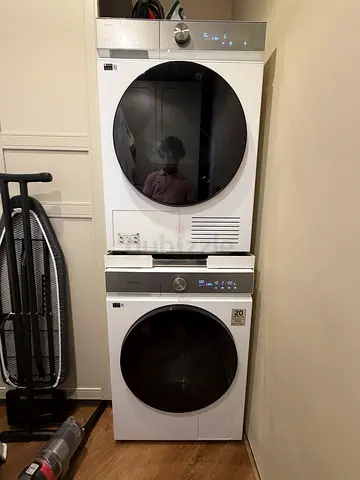 Stacked front-load washer and dryer set — good condition