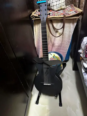 Matte Black Acoustic-Electric Guitar in Good Condition ( enya nova)