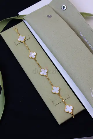 Gold-tone four-leaf clover bracelet with mother-of-pearl inlay