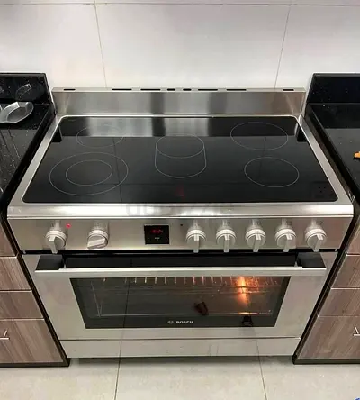 Bosch stainless steel electric range with ceramic hob and oven - good condition