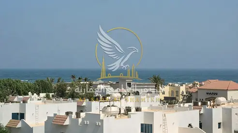 3 bedroom apartment with a living room for rent in Al Qulayaa Sharjah with a balcony and sea view central air conditioning