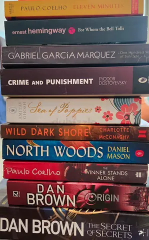 Collection of paperback fiction — classics, thrillers, contemporary