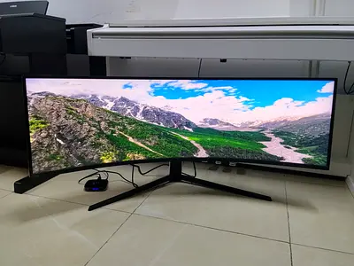 The Samsung Odyssey Neo G9 (49-inch) is a premium, super ultra-wide 32:9 curved gaming monitor featu